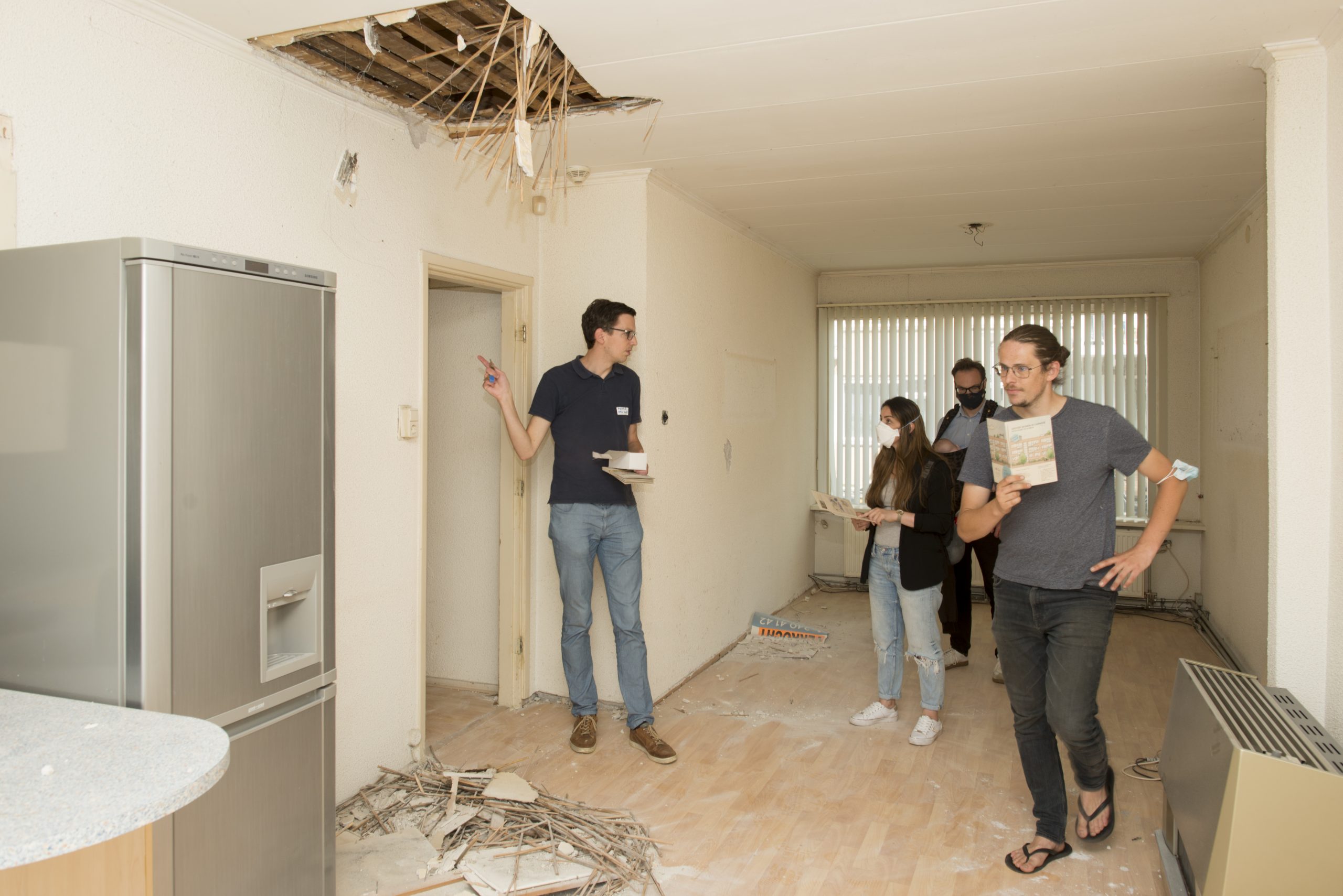 Prospective residents in a apartment open for combining